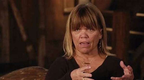 Amy Roloff's Secret Exposed in Background of New Photo!