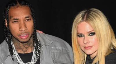 Avril Lavigne and Tyga Confirm Romance with Pda at Paris Fashion Week