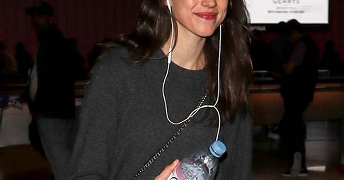 Bitchy | Margaret Qualley Jets into Lax with a Smile on Her Face