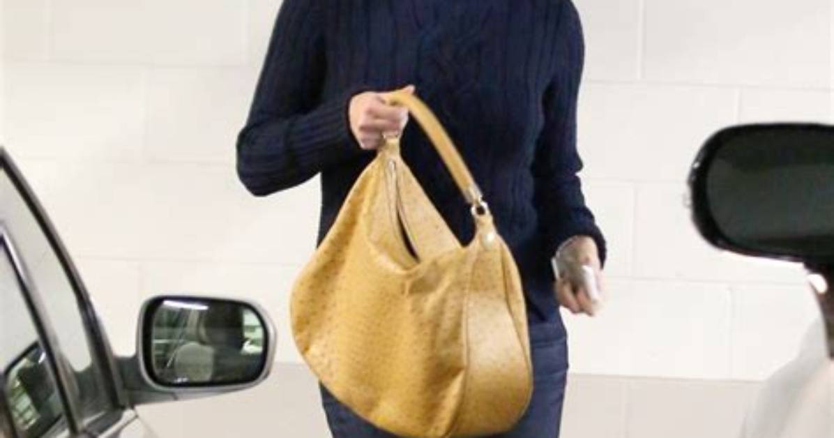 Charlize Theron’s Buzz Cut, Capris & Chunky Turtleneck: Awesome or Rough?