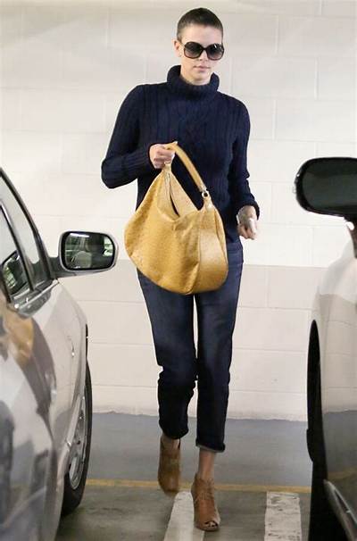 Charlize Theron’s Buzz Cut, Capris & Chunky Turtleneck: Awesome or Rough?