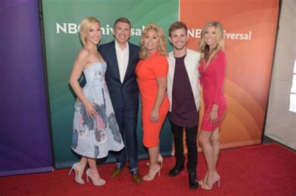 Chase Chrisley's Massive Liens Revealed Amid Parents' Sentencing