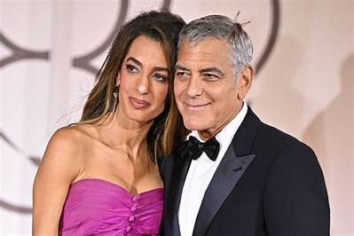 George & Amal Clooney Were Slammed Publicly by a Time Warner Shareholder