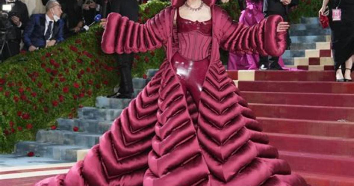 Gigi Hadid Went Futuristic with Versace Vinyl & a Huge Puffer Coat at the Met Gala