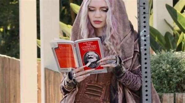 Grimes Vibed with ‘The Communist Manifesto’ & Claims She’s Still with Elon Musk