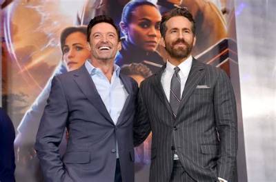 Hugh Jackman Jokingly Begs Academy Not to Nominate Ryan Reynolds’ ‘Spirited’ Song for Oscar