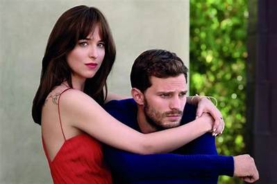 Jamie Dornan Thinks Dakota Johnson Gets ‘Really Distracted’ on ’50 Shades’ Set