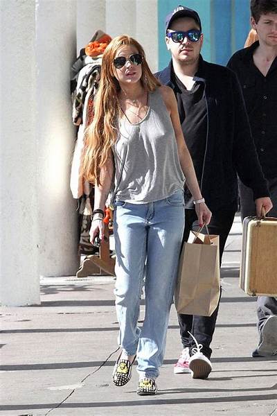 Lindsay Lohan Shows up to Make Braless Milkshakes in Her Nightgown