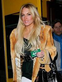 Lindsay Lohan Steals a $11,00 Fur Coat from Stranger
