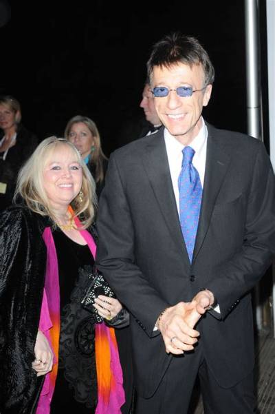 Married Bee Gee Robin Gibb Fathers Love Child with Maid