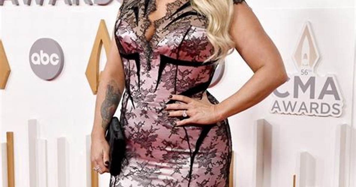 Miranda Lambert Rocks 2022 Cmas Red Carpet in Black and Pink Dress with Husband Brendan Mcloughlin