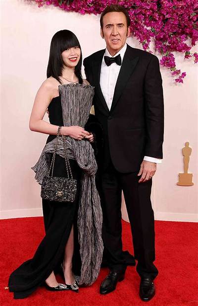 Nicolas Cage & His Fifth Wife Riko Shibata Cover Flaunt in the Desert