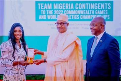 President Buhari Presents National Award to Tobi Amusan