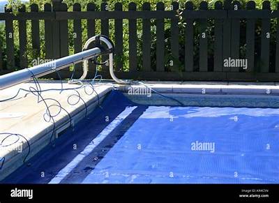 Should I Take My Pool Cover off During the Day?