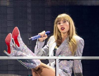 Taylor Swift Narrowly Avoids Falling off Her Chair in Eras Tour Mishap Caught on Camera
