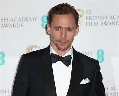 Tom Hiddleston Spent His 36Th Birthday Running in the Rain & Eating Cake