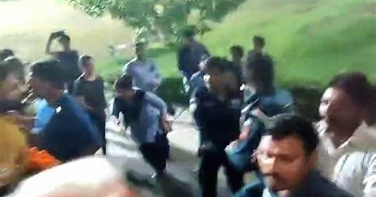 Two Women Hurt in Society Clash, Police Take 2 into Custody