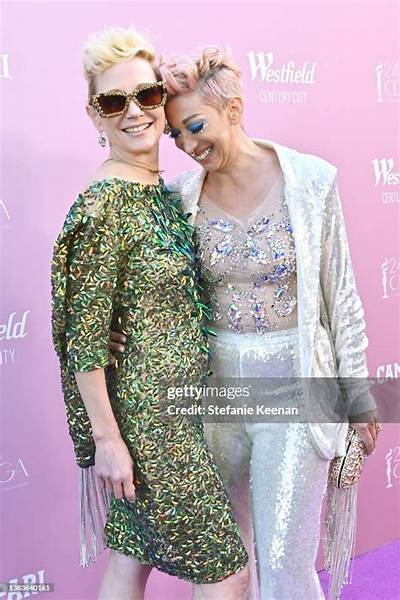 Who Is Ami Goodheart and What Did She Say About Cara Delevingne and Amber Heard Photos?