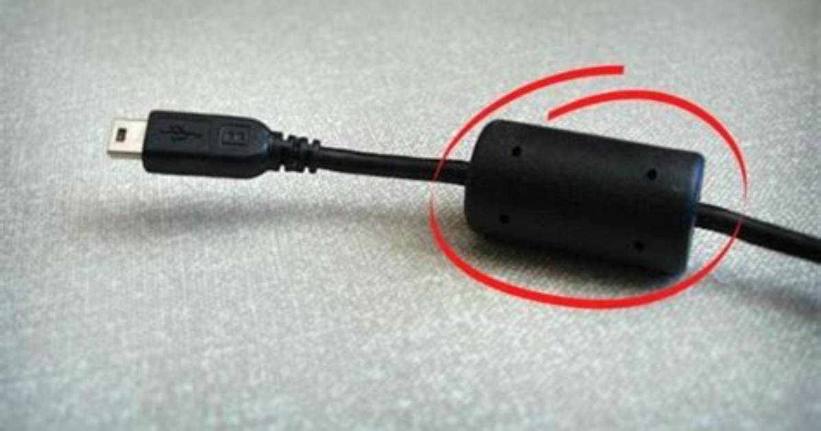 Why Laptop Charging Cable Has a Small Cylinder?