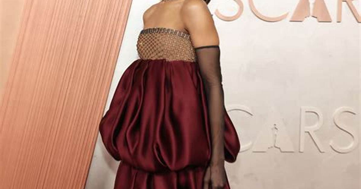 Zoe Saldana Dresses Her Bump in Red Silk for the Almas: Lovely or Frumpy?